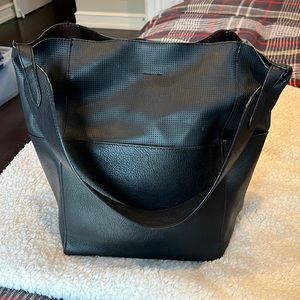 Anthropologie soft black leather bucket shoulder bag.